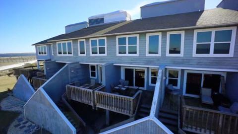 A Young Married Couple Scour Pensacola Beach for a Waterfront Vacation Home