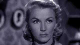 The Case of the Black-Eyed Blonde