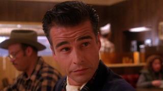 The Man Behind Glass