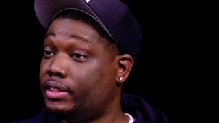 Michael Che Gs Up While Eating Spicy Wings Michael Che Gs Up While Eating Spicy Wings