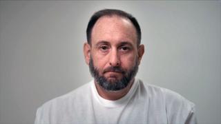 Murderous Cop or Innocent Gunman?