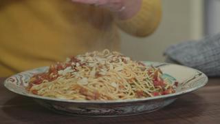 Harissa & Fire-Roasted Tomato Spaghetti With Speck and Toasted Almonds
