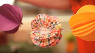 How to Make a Pom Pom Garland from Cupcake Liners How to Make a Pom Pom Garland from Cupcake Liners